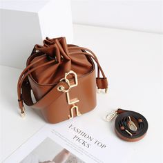 Free U.S. shipping. Style: Commuting , color:Brown, suite for season：Spring, Summer, Autumn, Winter ，Anniversary, Going out, Hanging out, Material Genuine Leather, Women's Brown Leather Drawstring Bucket Handbags Brown Shoulder Bag For Spring Evenings, Brown Shoulder Bag For Evening In Spring, Luxury Brown Square Bucket Bag, Trendy Brown Bucket Bag For Formal Occasions, Brown Shoulder Bag Gift For Spring, Brown Shoulder Bag As Spring Gift, Elegant Brown Bucket Bag As A Gift, Elegant Brown Bucket Bag As Gift, Luxury Brown Bucket Bag As A Gift