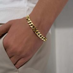 Miami Cuban Bracelet Gold is coated with 14k gold which makes it a perfect addition to anyone's bracelet collection. You can layer multiple bracelets for a cool look that enhances the style of your casual and formal outfits. This bracelet is comfortable to wear on a daily basis and has a metal clasp making for an easy getting on/off. You can get this piece as a perfect present for your homie on a special occasion or as a surprise gift. We know you’ll never want to take your Caligio bracelets off Golden Bracelet, Cuban Bracelet, Multiple Bracelets, Men's Bracelets, Miami Cuban, Formal Outfits, Surprise Gift, Bracelet Collection, Cuban Link