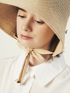 Editor's NotesELKE BLOEM's hat is lovely and perfect for daily wear.- Light-weighted- Eye-catching ribbon strap detail- Ideal sun shade for the face- Feminine and basic styleMeasurements(in.)- Size: One size.- Head Girth: 22.05in. ~ 23.62in.- Height: 5.12in.- Brim: 3.94in.Composition & Care- 65% Paper, 35% cotton- Avoid direct heat and moisture- Dry cleaning or hand wash is recommendedDesigner- by ELKE BLOEM Wide Brim Hat With Adjustable Strap For Spring, Chic Beige Straw Cloche Hat, Chic Beige Sun Hat With Short Brim, Chic Lightweight Beige Boater Hat, Chic Adjustable Wide Brim Bucket Hat, Chic Beige Straw Bucket Hat, Adjustable Brimmed Bonnet For Summer, Adjustable Brimmed Summer Bonnet, Adjustable Beige Sun Hat For Everyday