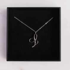 "L initial Necklace / Alphabet jewelry / Letter \"L\" silver pendant / Silver chain / Silver necklace / Dainty Silver chain and jewelry Dainty \"L\" initial. Perfect every day necklace. Lovely gift for your self, sister, bridesmaids, new mom. Convo me if you would like to customize the length of the chain. The possibilities are endless. Pendant: Base metal is brass and silver plated on top. Chain is 18 inches, sterling silver. (if you would like a longer or shorter chain, please contact us to cu L Initial Necklace, Every Day Necklace, Chain Silver Necklace, L Initial, Jewelry Letter, Chrysoprase Necklace, Alphabet Jewelry, Jewelry Dainty, Writing Gifts