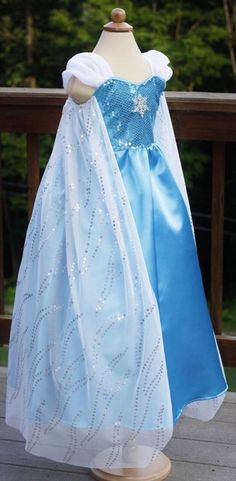 19 yards available. 58 inches wide. $18.00 per yard. Elsa Dress For Kids, Long Sleeve White Shirt, Rhinestone Snowflake, Summer Princess, Snowflake Dress, Frozen Dress, Princess Diy, Elsa Dress, Slip On Dress