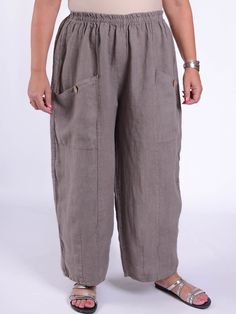 "Our popular Linen trousers are an absolute wardrobe essential. Made from a quality Italian linen fabric, they feature an elasticated waistband and deep front pockets. These pair perfect with any of our tops to create the Lagenlook style.   Wide Leg Trousers  Deep Front Pockets  Comfy Elasticated Waist  100% Heavy Quality Italian Linen  Loose and comfortable  Size 2 - UK 22 24 2 Hips 54\" (136cm)   Waist up to 54″ (136cm) - Elasticated   Size 3 -  UK 28 30 32 Hips 60\" (152cm)  Waist up to 60\" Relaxed Fit Plain Trousers, Linen Full-length Pants With Pockets, Full Length Linen Pants With Pockets, Full-length Linen Pants With Pockets, Style Wide Leg Trousers, Lagenlook Style, Trousers Pants, Pantalon Large, Linen Trousers