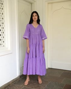 Amethyst three tier comfort fit dress with side pockets. Made of hand woven cotton in self textured weave. Shop this dress only at Kamakhyaa #kamakhyaa #womensfashion #dress #violetdress #maxidress #tiereddress #purpledress Weave Shop, Tiered Dresses, Tier Dress, Violet Dresses, Sustainable Clothing Brands, Conscious Fashion, Indian Fashion Designers, Cotton Midi Dress, Tiered Maxi Dress