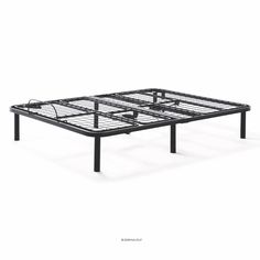 a metal bed frame sitting on top of a white floor