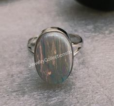 White Rainbow Fire Aurora Opal Rings 925 Sterling Silver Jewelry Statement Ring, Handmade Ring, Gift For Her Wedding Ring, For Jewelry Gemstone:   Aurora Opal  Gem Shape: Oval Metal: 925 Sterling Silver Silver Polish: High Ring Size: All Size Available Please note that there Can be slight variations in stone texture and color shades in the actual product that you receive. The stone quality or grade will be the same. Because We Use Natural Stones And All Natural Stones Are Not Of Same Textured. A Silver Opal Ring With Polished Finish For Wedding, Her Wedding Ring, Aurora Opal, Rainbow Fire, Silver Polish, Jewelry Statement, White Rainbow, Stone Texture, Jewelry Gemstone