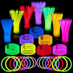 neon glow bracelets and rings are shown in the dark, with different colors to choose from