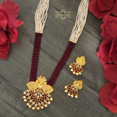 "Gold polki is just so perfect! This handcrafted all gold & maroon polki maala necklace set is no exception.  The earrings are approximately 1.85 \" long & 1.25 \" wide. Pictures are taken in room light indoors. Please contact if you have any questions. Thanks! Color, shades, texture displayed may slightly vary from the actual product due to digital image limitations. We request you to consider these minor variations. Please expect the possibility of some slight imperfections when buying hand ma 22k Gold Kundan Necklace With Cutdana For Celebration, 22k Gold Kundan Necklace For Celebration, Celebration 22k Gold Kundan Necklace With Cutdana, 22k Gold Kundan Necklace With Zari Work For Diwali, 22k Gold Kundan Necklace With Pallu For Diwali, Handmade Chandbali Bridal Necklace For Puja, 22k Gold Bollywood Kundan Necklace For Celebration, Festive 22k Gold Kundan Necklace With Zari Work, 22k Gold Kundan Necklace For Celebration In Bollywood Style