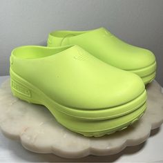 Questions? Leave A Comment Below! Spring Slip-on Slip-resistant Clogs, Spring Slip-resistant Slip-on Clogs, Sporty Synthetic Slip-on Clogs, Sporty Platform Clogs With Synthetic Material, Sporty Platform Clogs In Synthetic Material, Platform Synthetic Clogs For Streetwear, Low-top Clogs With Rubber Sole For Spring, Green Synthetic Clogs With Cushioned Footbed, Green Slip-on Synthetic Clogs