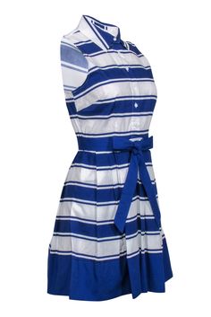 Take a peek at the bewitching beauty of this Milly shirt dress, where bold royal blue and white stripes come together to create a head-turning statement piece with a nautical feel. The fit-and-flare design, complete with a coordinating belt, pointed collar, and button-up front, exudes effortless sophistication, while the pleated skirt adds a playful touch. Perfect for a yacht party or a coastal retreat, pair this lightweight dress with wedged sandals and a sun hat for a chic ensemble that's both Blue Vertical Stripes Dress For Daywear, Blue Sailor Summer Dresses, Blue Sailor Style Summer Dresses, Sailor Style Blue Summer Dresses, Blue Nautical Dress For Summer, Blue Nautical Summer Dress, Blue Nautical Spring Dresses, Fitted Nautical Dress For Spring, Fitted Nautical Summer Dress