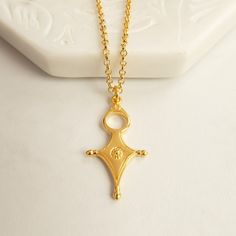 This minimalist bohemian statement necklace represent heaven, earth and the four cardinal points.  Similar to the Egyptian ankh it empowers the wearer with wealth, happiness and protection. This talisman / amulet charm necklace is small and subtle enough for everyday wear and to carry a little bit of luck and magic wherever you go.  Perfect as a treat for yourself or a gift for a loved one. Anyone who needs some magical positive energy. Every order comes in beautiful packaging with a free gift b Necklace Women Gold, Dnd Things, Cardinal Points, Egyptian Ankh, Festival Necklace, Minimalist Necklace Gold, Amulet Charm, Talisman Pendant, Talisman Necklace