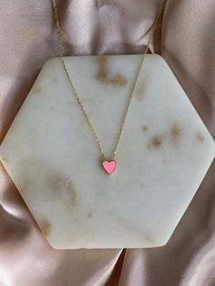 This heart necklace is so dainty and gorgeous, perfect for everyday wear! Information: 💖 The necklace is made of Sterling Silver, plated with 14K Gold. 💖 The pink color in the heart is made of enamel. 💖 The chain is a cable chain, adjustable to a total of 18 inches. 💖 Hypoallergenic 💖Water friendly This necklace makes a perfect gift and it's just right to layer with your other jewelry. Pink Heart Pendant, Heart Necklace Gold, Pink Heart Necklace, Buddha Necklace, Preppy Room, Beaded Jewelry Designs, Buddha Pendant, Enamel Necklaces, Gold Heart Necklace