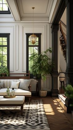 a living room filled with furniture and lots of windows next to a stair case in front of a window