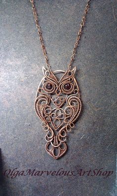 Owl+wire+wrapped+owl+with+garnet+owl+pendant+handcrafted Metal Necklaces With Intricate Design For Gift, Metal Necklace With Intricate Design For Gifts, Metal Filigree Pendant Necklaces, Handmade Silver Copper Necklace, Handmade Delicate Metal Jewelry, Delicate Handmade Metal Jewelry, Artistic Jewelry With Intricate Design For Gift, Unique Silver Necklaces With Copper Material, Copper Filigree Jewelry As A Gift