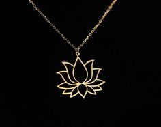 Lotus Flower Necklace: A Symbol of Spiritual Growth, Purity, and Enlightenment The lotus flower is revered for its unique beauty and rich spiritual meaning in many spiritual traditions. The lotus flower represents spiritual enlightenment, purity, and divine beauty in Hinduism and Buddhism. It is regarded as a symbol of spiritual awakening because it grows from the muddy bottom of a pond and blooms into a beautiful and fragrant flower, symbolizing the journey from ignorance to enlightenment. The Mother's Day Flower Pendant Necklace, Spiritual Flower Necklace For Gifts, Spiritual Flower Necklace For Gift, Spiritual Flower Necklace Gift, Spiritual Flower Pendant Necklace Gift, Spiritual Flower Pendant Necklace, Spiritual Lotus Flower Jewelry For Meditation, Spiritual Lotus Flower Necklaces For Gifts, Mandala Symbols