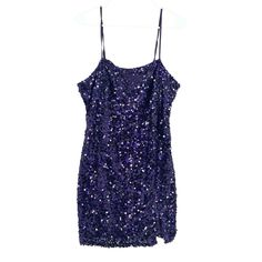 Wild Fable Women’s Sleeveless 20’s Style Sequin Party Dress Purple Size L Get Ready To Sparkle And Shine In This Stunning Wild Fable Women's Dress! The Dress Features A Sleeveless Design With A Zip Closure, Perfect For A Party Or Cocktail Event. The Purple Polyester Material Is Adorned With Sequin Accents, Adding A Touch Of Glamour To The 20s Style Mini Dress. This Dress Is A Size L And Is Perfect For Any Regular Sized Woman. It Is Not Vintage And Was Made In Indonesia. The Dress Is Not Handmade Glamorous Purple Sleeveless Sequin Dress, Sleeveless Purple Sequin Dress With Contrast Sequin, Purple Contrast Sequin Sleeveless Dress, Vintage Sleeveless Sequin Flapper Dress, 20’s Style, Purple V-neck Mini Dress With Sequins, Cocktail Event, Wild Fable, Sequin Party Dress