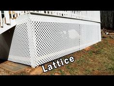 the side of a house with lattice on it