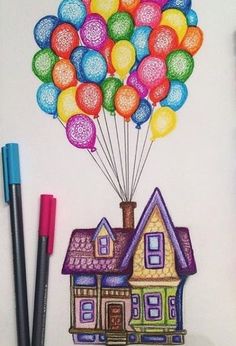 a drawing of a house with balloons in the shape of a house and two crayons