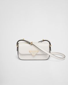 White Leather Shoulder Bag | PRADA Classic White Shoulder Bag With Metal Logo, Formal White Bags With Metal Logo, White Shoulder Bag With Metal Logo For Evening, Classic Rectangular Shoulder Bag With Metal Logo, White Formal Flap Bag With Branded Hardware, Formal White Flap Bag With Branded Hardware, Leather Crossbody Flap Bag With Metal Logo, Designer Formal Shoulder Bag With Metal Logo, Designer Metal Logo Shoulder Bag For Formal Occasions