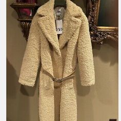 Sold Out!!! Super Super Cute Zara Faux Shearling Teddy Long Coat Very Nice Heavyweight Materials!! Condition Is "New With Tags" Never Worn!! Cream Beige Color Coat Come With Belt Size: S Beige Faux Fur Lined Coat For Work, Beige Faux Fur Coat For Workwear, Chic Beige Fur Coat For Cold Weather, Zara Winter Fur Coat With Faux Fur Trim, Cream Fur Coat With Faux Fur Lining For Fall, Cream Fur Coat With Faux Fur Trim For Fall, Cream Faux Fur Trim Coat For Fall, Winter White Fur Coat For Winter, Chic Beige Fur Coat For Winter