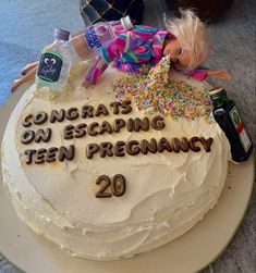 a birthday cake with confetti and sprinkles on it that says congrats on escaping teen pregnant 20