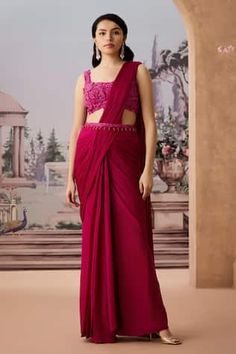 Magenta pre-draped saree in a solid textured base. Comes with applique embroidered padded blouse, embellished by beads and sequins. Paired with embellished belt. - Aza Fashions Draped Choli For Formal Occasions, Formal Draped Choli, Draped Blouse With Cutdana, Floor-length Blouse For Reception, Fitted Pre-draped Saree With Side Open, Sleeveless Formal Pre-draped Saree, Pre-draped Blouse Piece For Reception, Fitted Draped Blouse Piece For Reception, Formal Sleeveless Choli