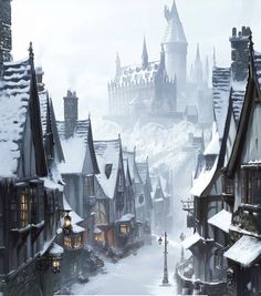 a snow covered town with lots of tall buildings on the top of it's sides