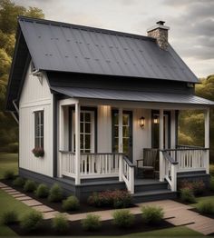 a small white house with a porch and stairs leading to the front door is shown in an artist's rendering