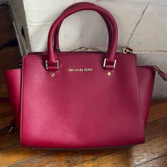 Used And Still Like Brand New. Minor Flaws (Minor Stains Inside Bag, Few Marks On Bags, Color On Feet Have Faded , No Tears). Marks Can Be Easily Removed With Leather Cleaner/Stain Remover. True Color Of Bag Is The First Picture. Michael Kors Burgundy Shopping Bags, Michael Kors Burgundy Bags With Branded Hardware, Michael Kors Burgundy Bag, Leather Cleaner, Crossbody Satchel, Bags Michael Kors, Inside Bag, Michael Kors Crossbody, Satchel Bag