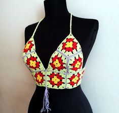 "Handmade Crochet top bralette beach wear, festival top SİZE ::Medium Large  25\"minimum waist. adjustable waist with laces for large READY TO SHIPP Please check your registered address is up to date on Etsy There is an express shipping option (need phone number) I send your orders by Turkish Postal Service with a registered number. The items will be shipped in Turkey after payment within 3-5 business days, and it normally will take 20-25 business days for delivery. Not valid time for days like Handmade Fitted Crop Halter Top, Handmade Fitted Halter Crop Top, Yellow Halter Neck Top For Festival, Handmade Cropped Halter Top, Fitted Crochet Lace Crop Top For Festivals, Handmade Fitted Crop Top For Spring, Green Cropped Crochet Top For Summer, Fitted Yellow Crochet Top For Summer, Summer Hippie Crochet Top With Granny Square