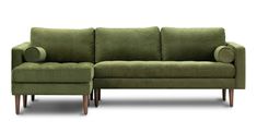 a green couch and footstool sitting next to each other on a white background