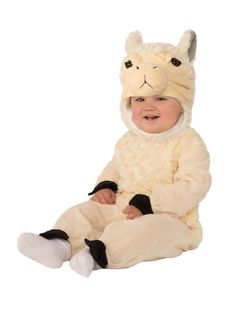 a baby in a llama costume sitting on the floor