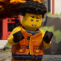 a lego man with an orange jacket and black hair