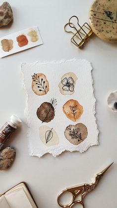 an assortment of crafting supplies on a table