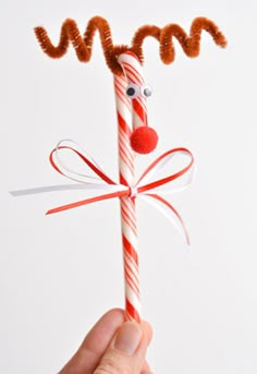 the candy cane has been decorated to look like a reindeer