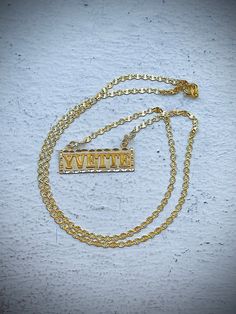 At 8ightyeight, we recognize the style power of versatile classics. Spell it out with gold. This personalized nameplate necklace is studded with a name or word of your choice (up to eight characters) in Clarendon font.   The Nameplate comes with a twisted star necklace chain. The nameplate is made in 14K Authentic Gold. The plate is 30 mm in width and 11 mm in height. Classic Nameplate Necklaces, Classic Engraved Nameplate Necklace, Luxury Customizable Nameplate Necklaces, Classic Nameplate Necklace, Luxury Nameplate Necklace For Personalized Gift, Classic Custom Nameplate Necklace, Luxury Personalized Nameplate Necklace, Luxury Engraved Name Necklace For Personalized Gift, Luxury Customizable Nameplate Necklace