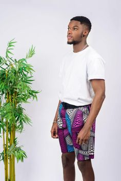 These African Print (Ankara) Unisex shorts are perfect for a beach day in the summer. These shorts will not only look great, but they will also feel great! Shorts are named after the Yoruba ethnic group (from Nigeria) dance style; Gese.  Ankara wax cotton (exclusive of ornamentation & back pocket) Comfortable elasticized waistband with drawstring Two side pockets One back pocket Bassi is 6'2" and wearing size Large  Does not come with shirt/top Handmade in Nigeria  Fabric placement may vary from Nigeria Dance, Dance Style, Dance Fashion, African Fabric, Waxed Cotton, Unisex Shorts, African Print, Shirt Top, Beach Day