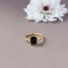 Exquisite ring set with an 8x6 mm Black Onyx and 10 natural diamonds. Beautifully made and finished in your choice of gold. - Made to Order, perfectly finished, Fast shipping fully insured and trackable online. - Made in 10/14/18 Karat Solid gold, Choose from White, Yellow and Rose. - Onyx info: Onyx 8x6 mm, radiant cut, 1.72 ct - DIamond info: 10 Natural Diamonds 1.25 mm, VS-E, 0.12 ctw - Arrives gift ready with a certificate of authenticity. Classic Onyx Rings For Promise, Classic Onyx Promise Ring, Timeless Onyx Gemstone Rings, Elegant Black Birthstone Ring For Anniversary, Modern Onyx Ring For Anniversary, Elegant Stackable Rings With Accent Stones For Formal Events, Timeless Onyx Rings For Anniversary, Elegant Stackable Rings With Accent Stones For Formal Occasions, Modern Onyx Rings For Anniversary