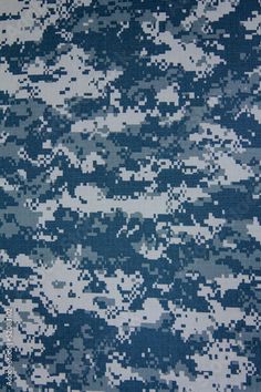 an abstract camouflage pattern in blue and white