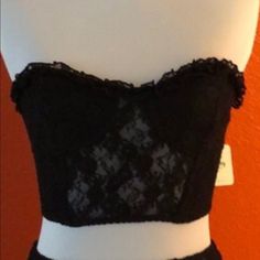 Nwt Super Cute Elastic Lace Bandeau With Inside Satin Cup Lining. Lace Trim On Top, Front Detailing Around The Cups, Stays On Both Sides To Keep Bandeau In Place. Never Worn, No Holes Or Stains. Perfect Condition Party Fitted Bandeau Bra, Party Bandeau Bra Fitted, Fitted Strapless Bra With Lace Trim, Stretch Bandeau Bra For Night Out, Black Sleeveless Corset With Lace Closure, Strapless Partially Lined Bra For Parties, Fitted Lace Bandeau Bra, Strapless Bra-friendly Corset For Night Out, Fitted Camisole Bra For Night Out