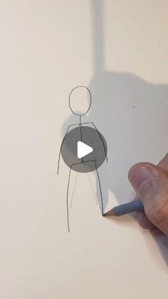 someone is drawing a man with a pencil