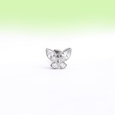 This Shiny Titanium Butterfly Stud is the perfect accessory for any butterfly lover! It's made from titanium, making it both durable and stylish. The shiny finish adds a touch of elegance, making it a must-have for any jewelry collection. Don't miss out on this beautiful piece! Detail： -Material: Titanium -Lightweight and sensitive skin friendly. -Gauge: 16g | 1.2mm-Post length: 8mm -Dimensions: 5.8mm Length x 7mm Width-Include: single item -Screw diameter: 0.8mm -Closure: internally threaded fl Hypoallergenic White Gold Butterfly Jewelry, Silver Butterfly Stainless Steel Jewelry, Minimalist White Gold Butterfly Jewelry, Minimalist Silver Butterfly Jewelry, Minimalist Silver Butterfly Charm Jewelry, Minimalist Silver Jewelry With Butterfly Charm, Shiny Butterfly, Fall Essentials, Belly Rings