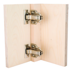 two metal latches on the side of a wooden door