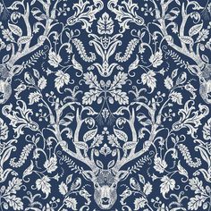 a blue and white wallpaper with deer heads