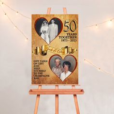 an easel with a 50th anniversary card on it