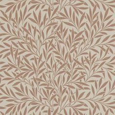 a beige and brown wallpaper with leaves on it