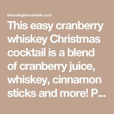 this easy cranberry whiskey christmas cocktail is a blend of cranberry juice, whiskey, cinnamon sticks and more