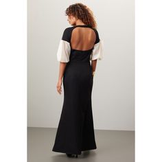 Black jersey (61% Cotton, 29% Viscose, 10% Silk). Lining (100% Cotton). A-line. Short sleeves. Sweetheart. Front button closure. 60" from shoulder to hemline. Made in the USA of imported fabric. Fitted A-line Dress With Button Back, Chic Evening Dress With Button Back, Chic Evening Dresses With Button Back, Fitted A-line Maxi Dress With Lined Bodice, Chic Fitted Dress With Button Back, Fitted Dress With Button Back For Work, Queen Of Hearts Dress, Romantic Maxi Dress, Hearts Dress