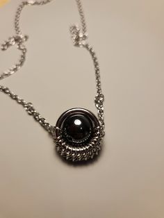 "**All orders placed on or after December 3rd are not guaranteed to arrive before Christmas!! As its only me handmaking each item all available dates have been filled. I make each order in the order i receive them. My apologies for any inconvenience This is a fun little pendant necklace I made with stainless steel chain, a 14mm hematite bead and some stainless steel rings to hold it all together.  It turned out so fun. The bead spins freely inside the little \"cage\" around it. The bead does sit very securely in the chainmail. It won't come out.  I will make the necklace the length you need. It will have a small stainless steel lobster clasp as a closure." Silver Hematite Necklace Gift, Fidget Necklace, Chain Mail, Hematite Beads, Stainless Steel Rings, Stainless Steel Chain, Jewelry Necklace Pendant, Jewelry Necklaces, Gift Card