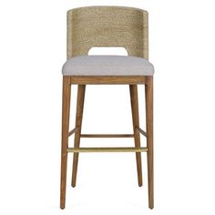 an upholstered bar stool with a beige seat and backrest, against a white background