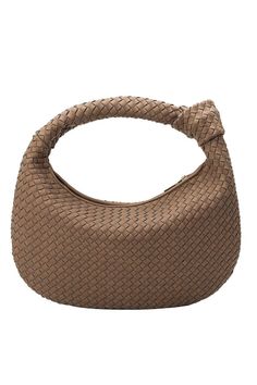 a brown woven bag on a white background with the handle in the shape of a circle